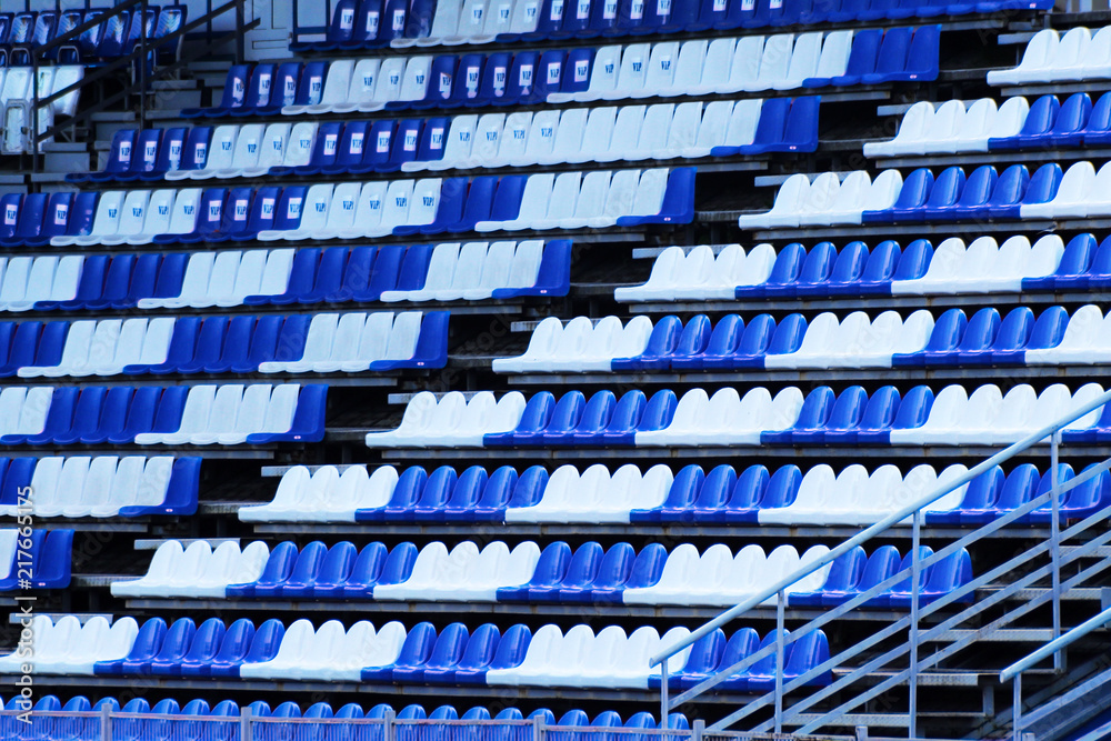 Fototapeta premium amphitheater of dark blue and white seats abstract background