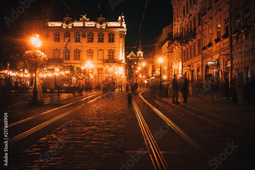 Fototapeta Naklejka Na Ścianę i Meble -  Old European city pedestrian street night city lights