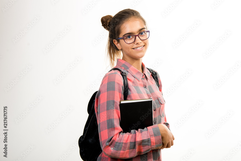 happy girl student. Smiling schoolgirl on a white background. A student with books backpack, a teenager with glasses.
