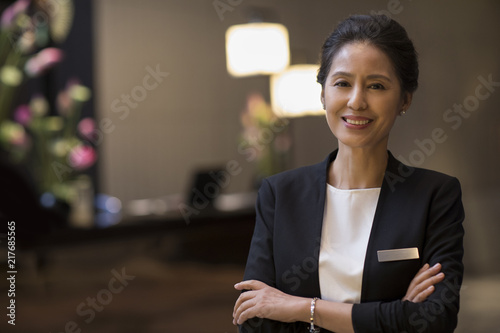 Portrait of confident hotel manager