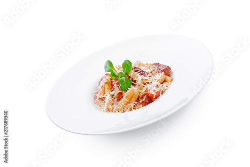 Fresh homemade pasta in a white plate dish close up