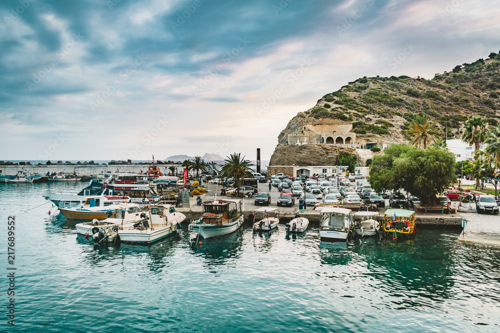 Agia Galini,Crete, Greece - August, 2018: fishing boats in the harbor of agia galini on the south coast of crete, greece