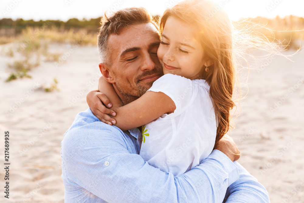 Happy father spending fun time with his little daughter