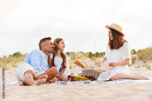 Cheerful family with father, mother, daughter