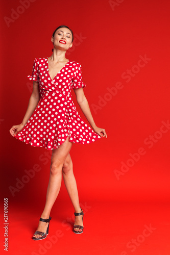 Portrait of a funny emotional young woman. Pin-up style. © fotofabrika