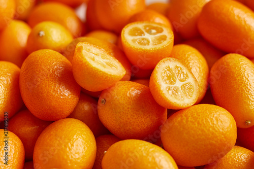 Bunch of fresh kumquats in the organic food market