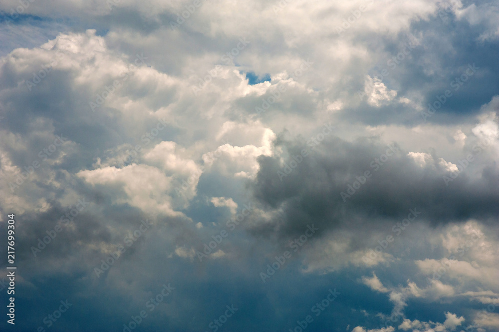 Beautiful white clouds in the blue sky as texture. Creative concept idea background. Beautiful white clouds in the blue sky as texture. Creative concept idea background.