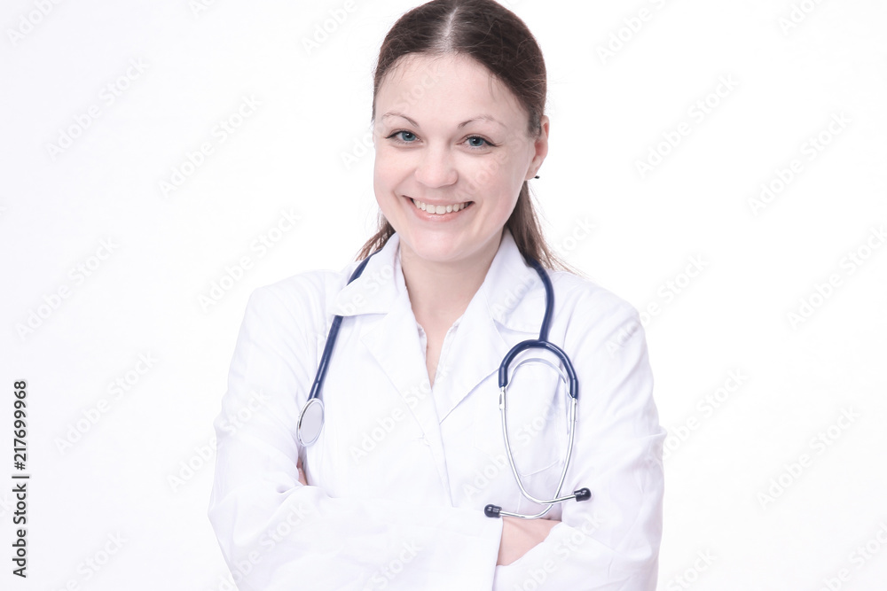 Portrait of young happy female doctor with crossed hands Portrait of young happy female doctor with crossed hands