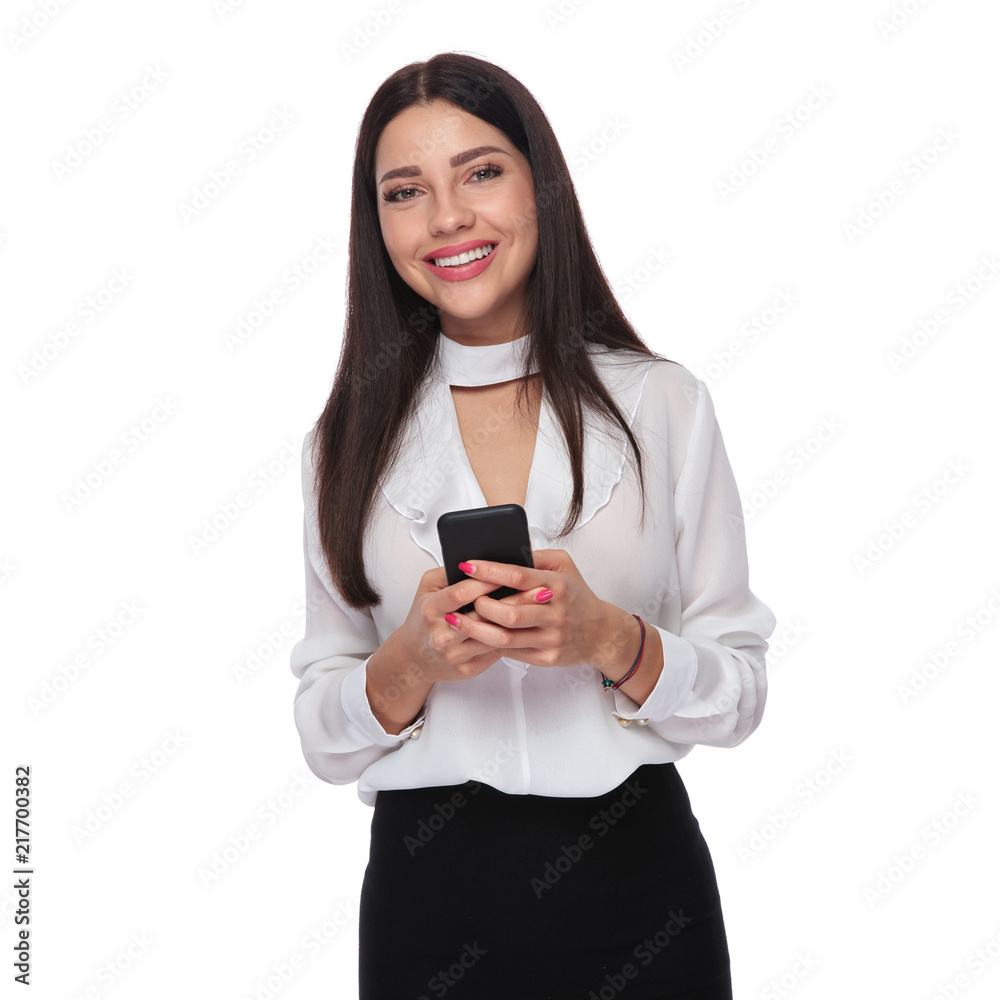 portrait of beautiful businesswoman sending a text message portrait of beautiful businesswoman sending a text message