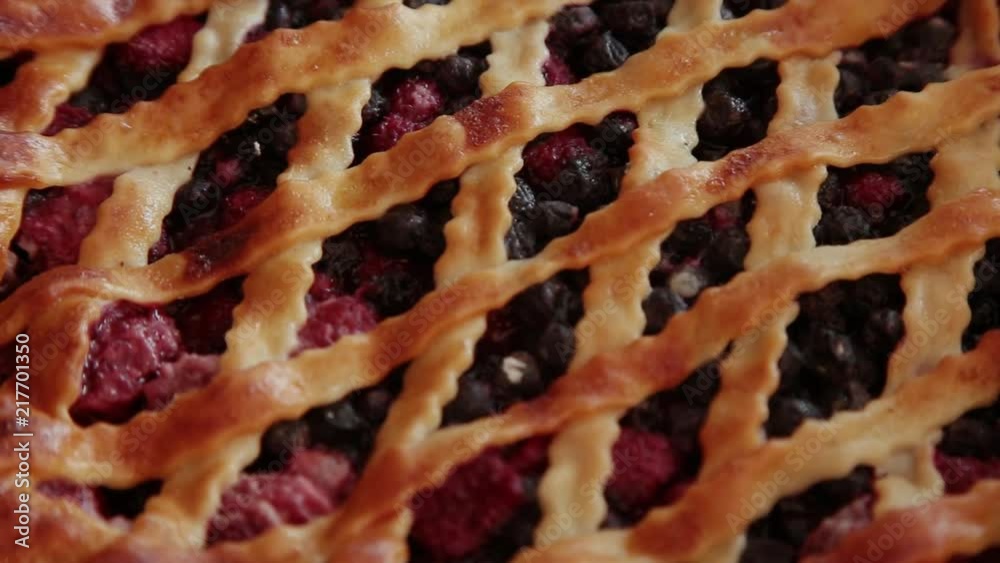 Berry cake made by own hands on a wooden background. Berry cake made by own hands on a wooden background.