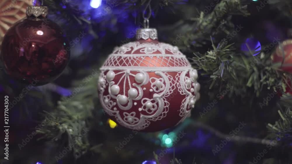 Christmas and New Year Decoration. Abstract Blurred Bokeh red Holiday Background. Blinking Garland. Christmas Tree Lights Twinkling. Christmas and New Year Decoration. Abstract Blurred Bokeh red Holiday Background. Blinking Garland. Christmas Tree Lights Twinkling.