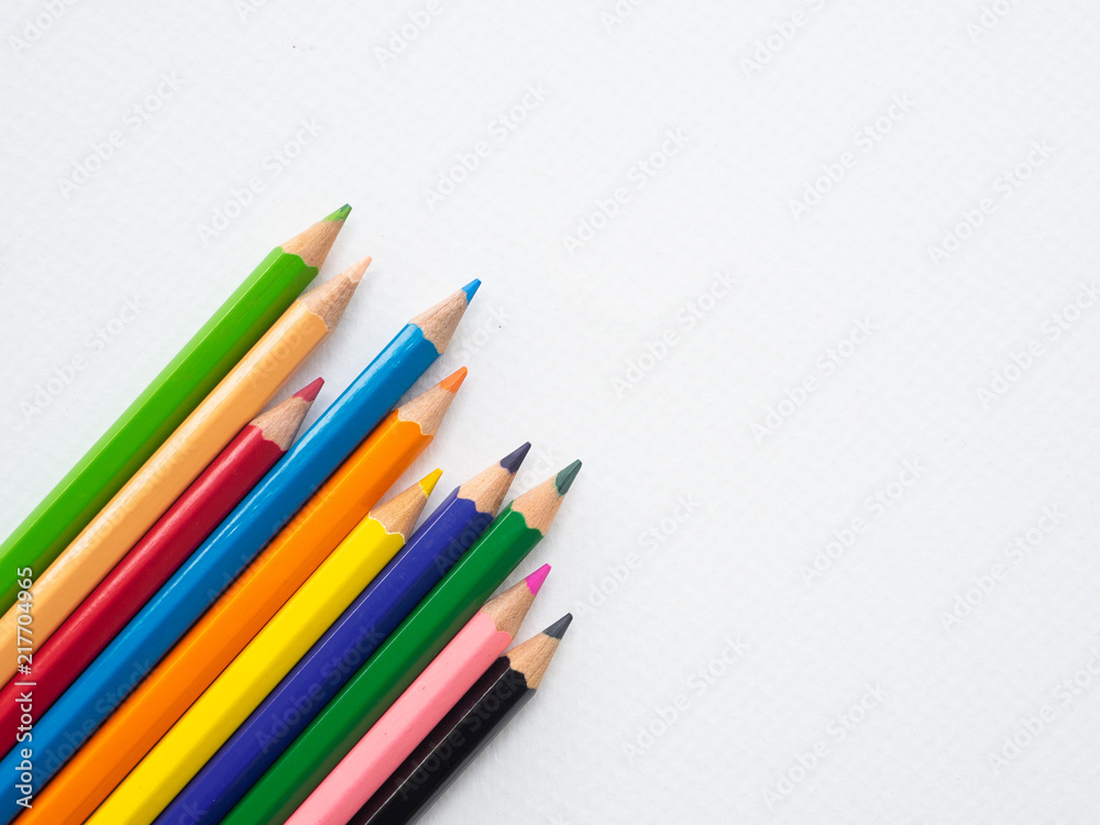 Closeup color pencils isolated on white paper background. Education, Back to school Concept.