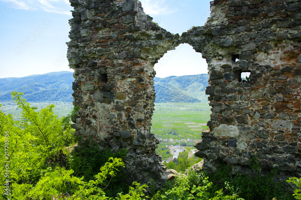 Ancient ruins of the castle of the town of Khust (Dracula Castle). a huge and powerful castle that performed a defensive function and played an important role in many battles. Western Ukraine, Europe