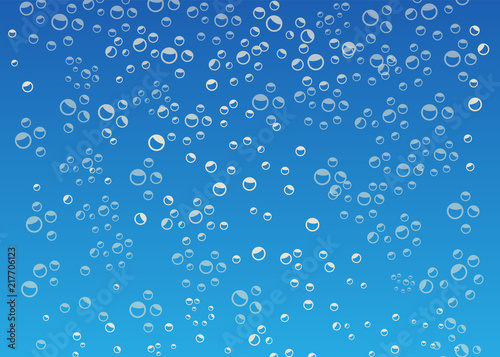 Bubbles in water on blue background. Bubble blue air background