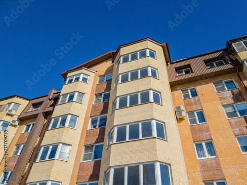 Multistory building. Apartments in the house. Facade.