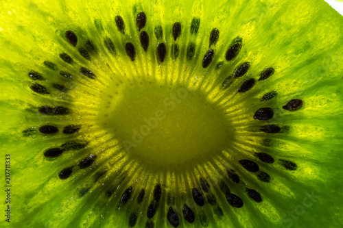 Kiwi fruit texture background with selective focus and crop fragment