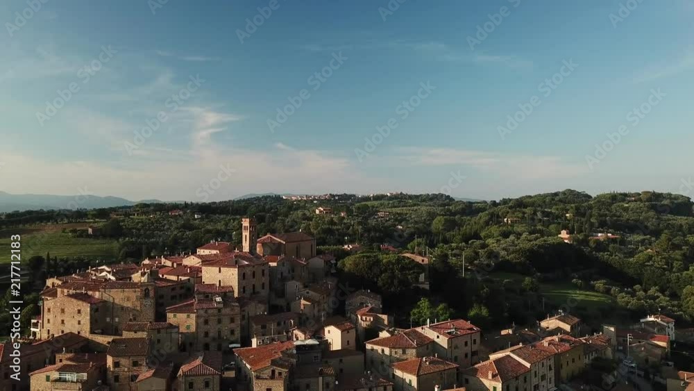 Aerial: Flight over a medieval Town of Casale Marittimo, Tuscany, Italy on a lovely summer sunset Aerial: Flight over a medieval Town of Casale Marittimo, Tuscany, Italy on a lovely summer sunset