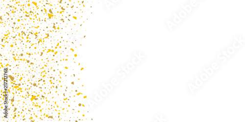 Golden glitter confetti on a white background.