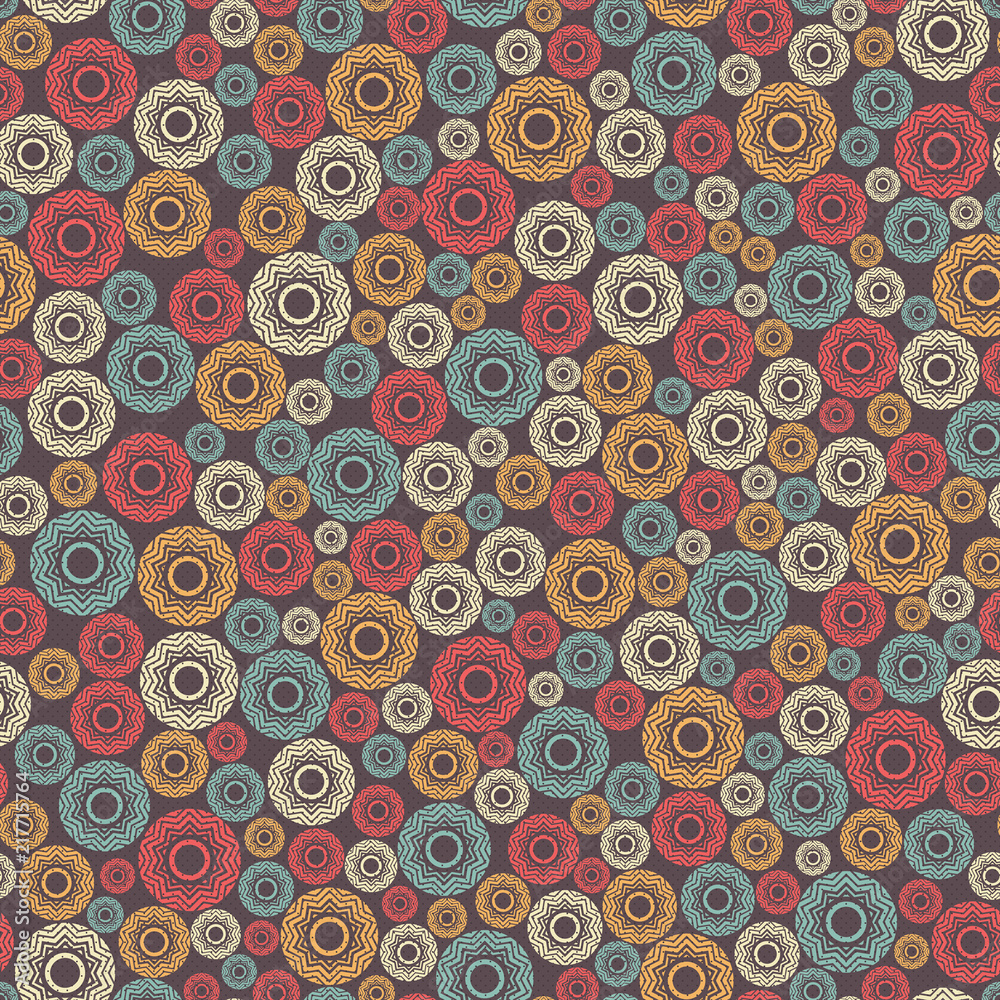 Vintage geometric seamless pattern. Elements of round shape, located on a dark brown background.