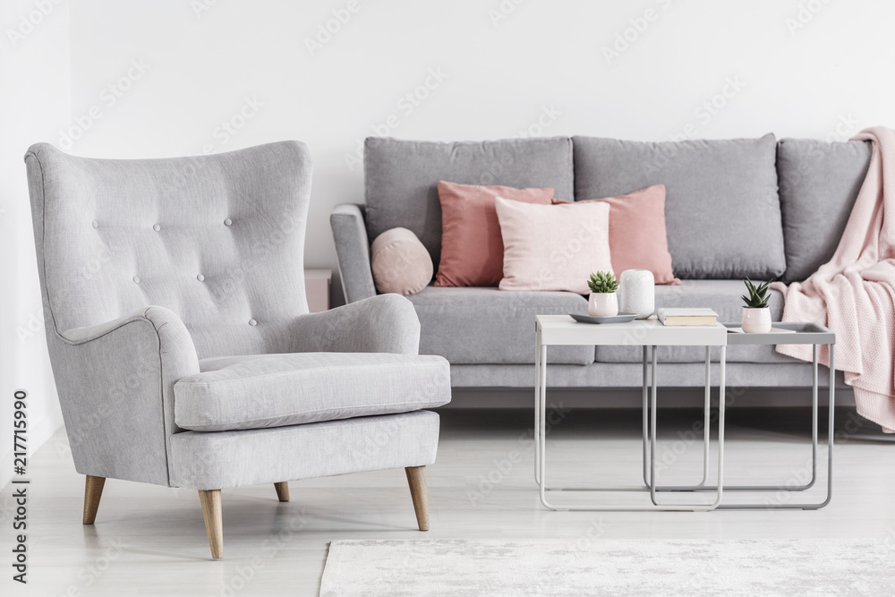 Comfy sofa with pillows in living room Stock Photo by