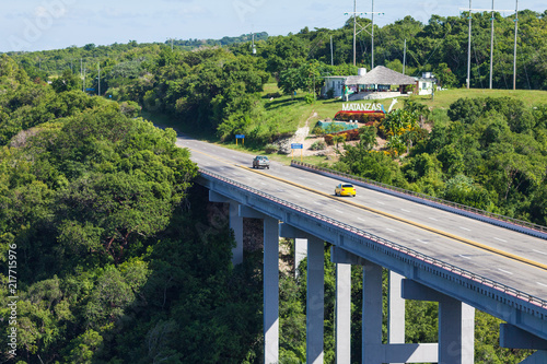 The Bridge of Bacunayagua crosses the canyon  and at 110 meters above the valley floor is the highest bridge in Cuba and is the road from Havana to the Matanzas Province.