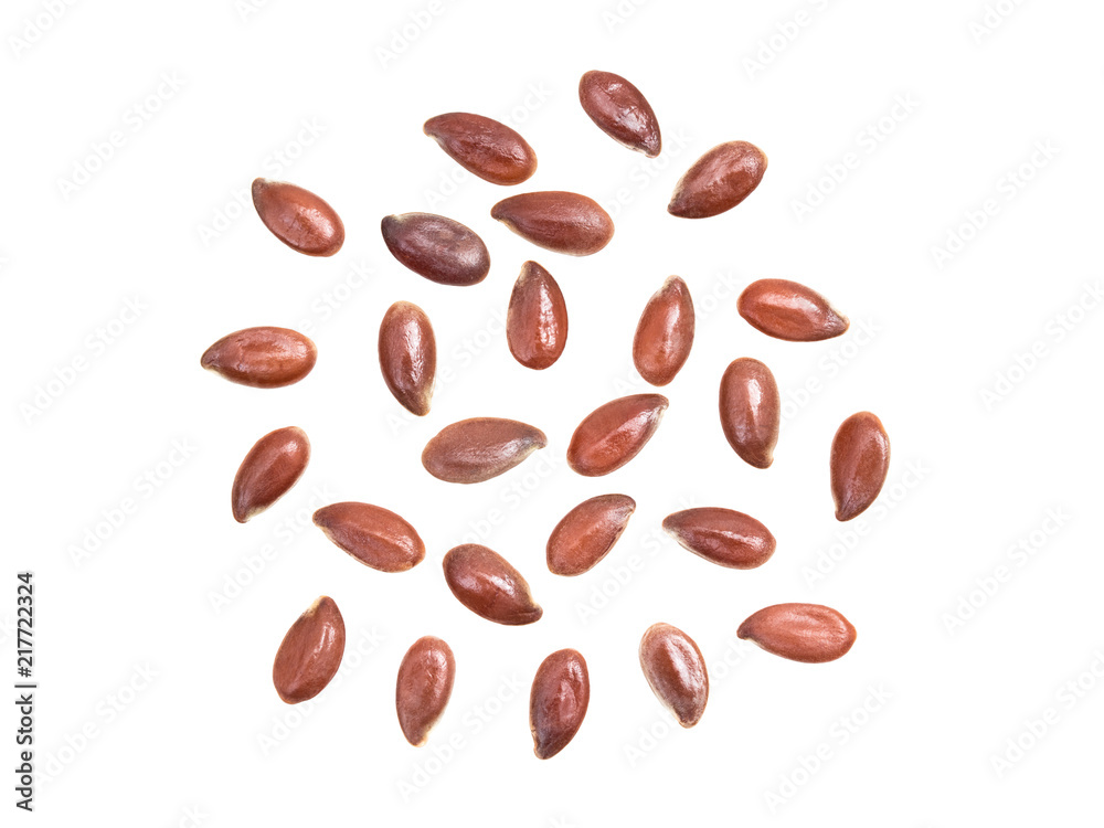 Some linseeds or flax seed spread out isolated on white background Some linseeds or flax seed spread out isolated on white background