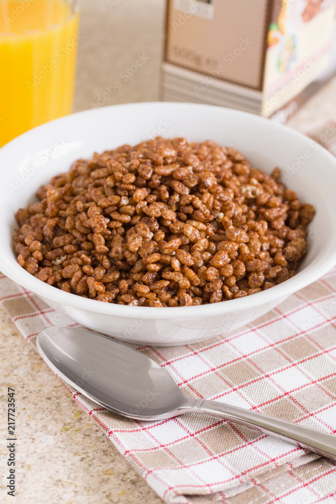 Chocolate flavoured crispy rice breakfast cereal top down view Chocolate flavoured crispy rice breakfast cereal top down view