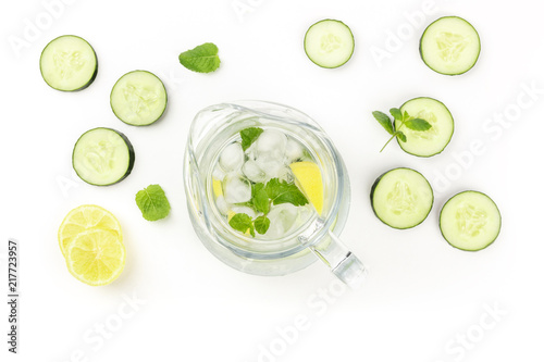 Cucumber, lemon and mint lemonade in a jar on a white background with copyspace