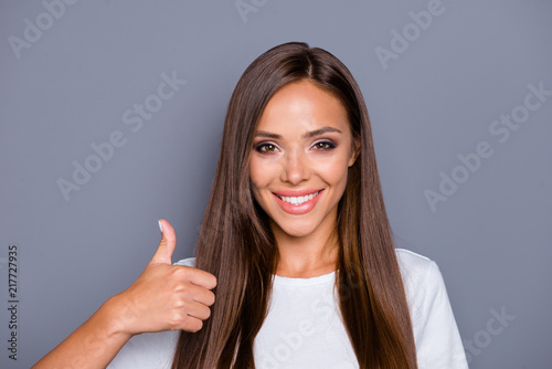 Portrait of brown-haired gorgeous attractive nice smiling young 