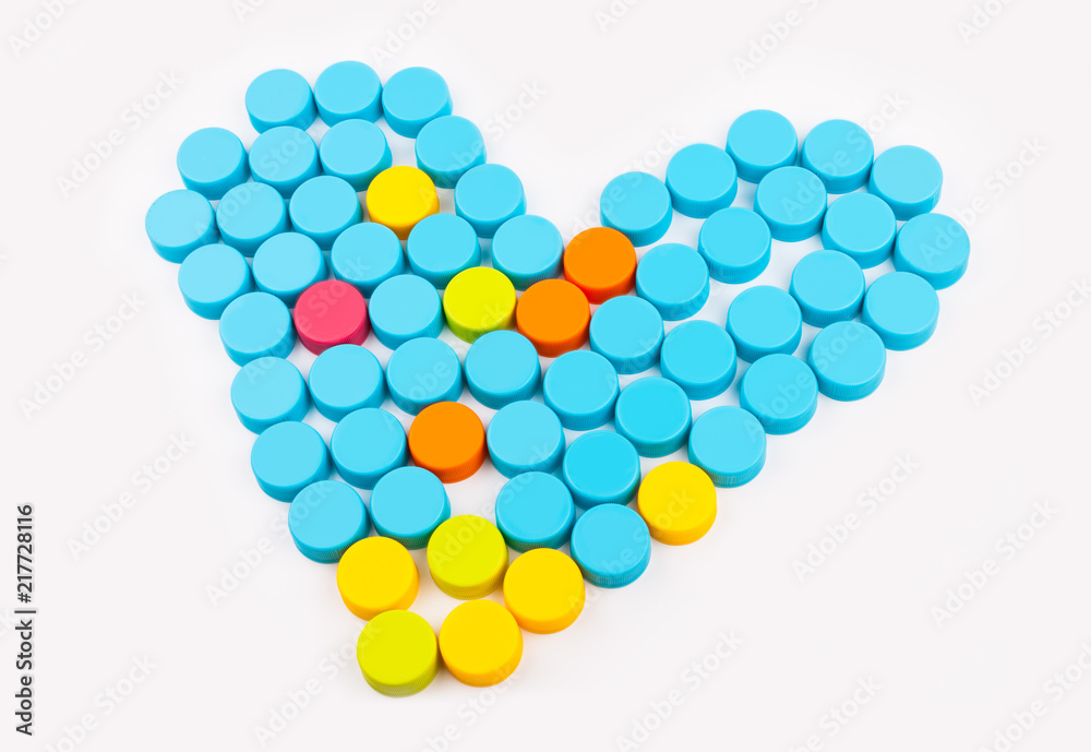 Plastic bottle caps on white background Plastic bottle caps on white background