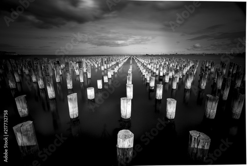 Obraz na płótnie Old Pier and Buildings in Melbourne, Black and White Long Exposure w salonie
