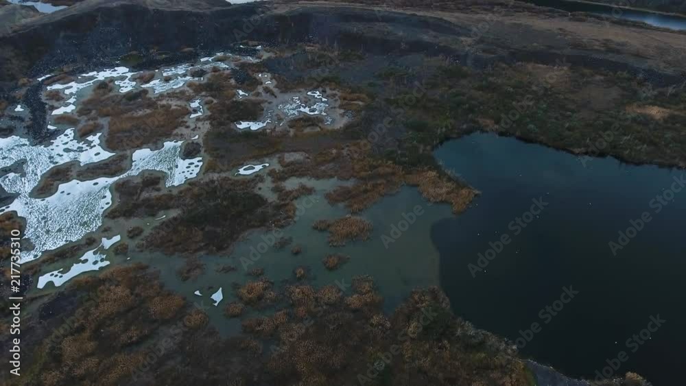 Flying over the salty lake contaminated with waste. Flying over the salty lake contaminated with waste.