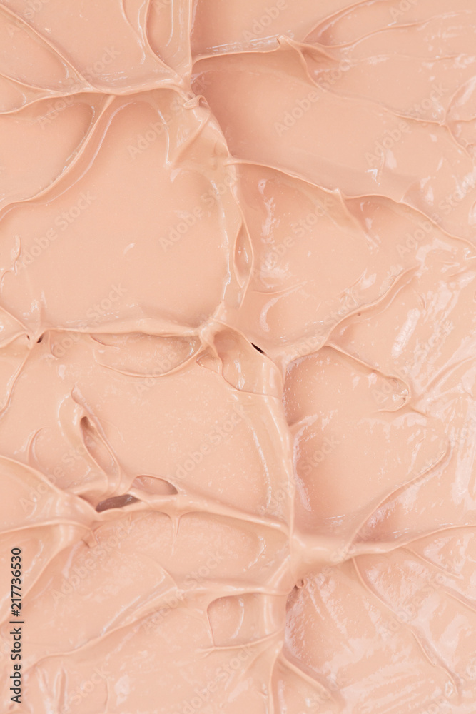 Fototapeta premium Texture of foundation for face. Face foundation. Smears of facial toning cream.