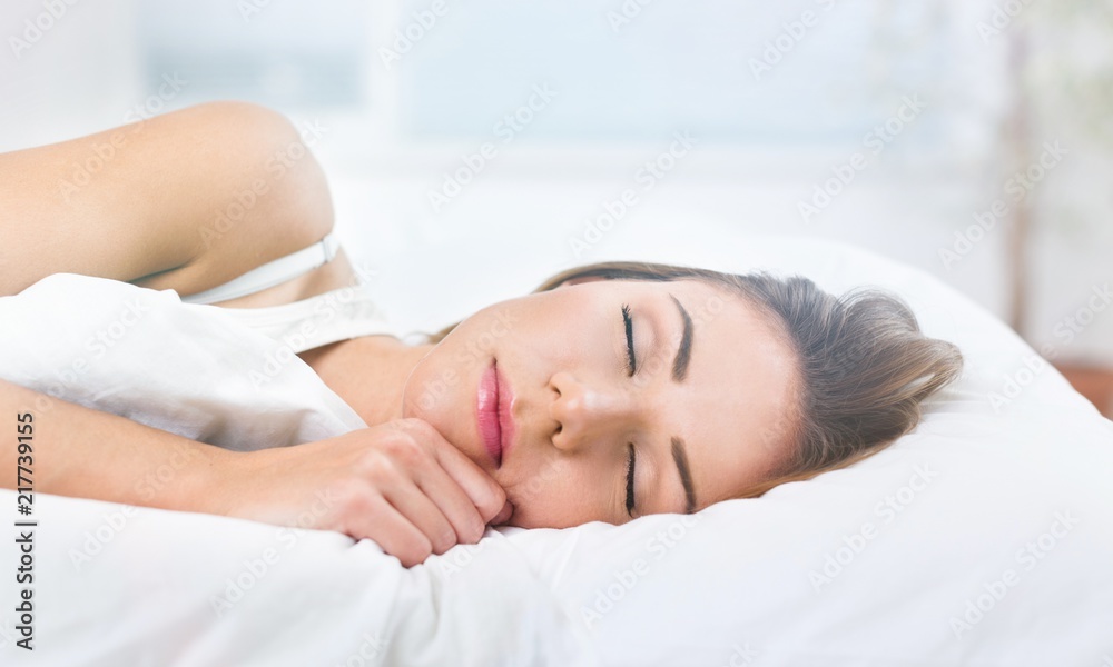 Young woman wakeup after sleeping on the Young woman wakeup after sleeping on the