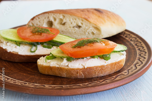 Sandwich with cream cheese. A traditional breakfast sandwich. Close-up.