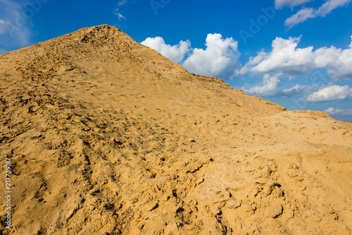 sand dune on the background of cloudy sky photo