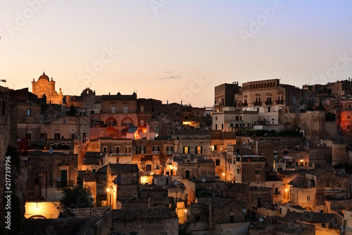 Panoramic view of ancient town of Matera (Sassi di Matera) by evening. Basilicata, Italy.