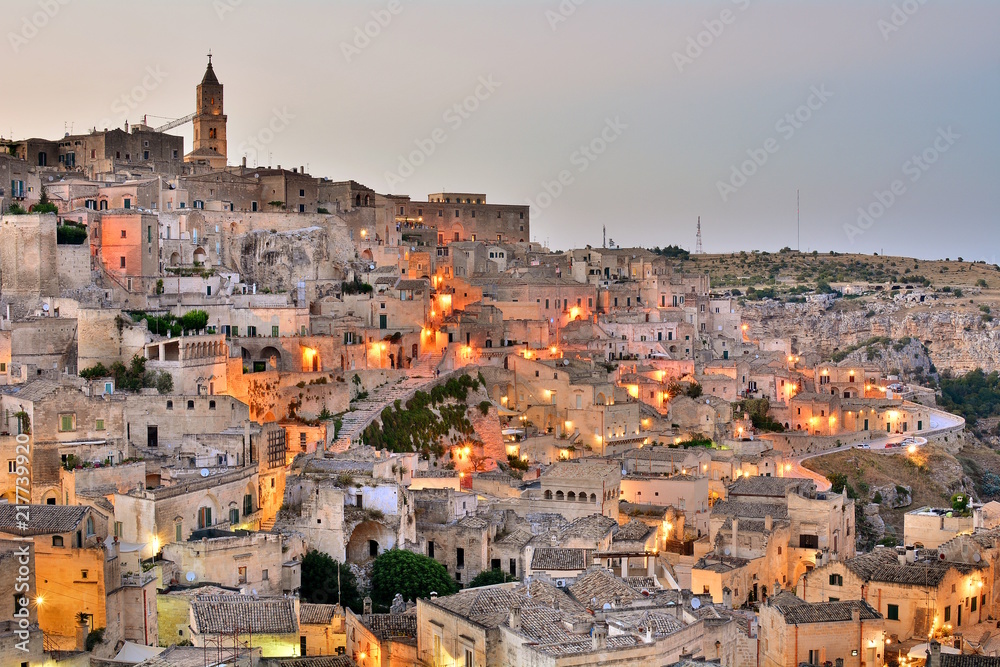 Panoramic view of ancient town of Matera (Sassi di Matera) by evening. Basilicata, Italy.