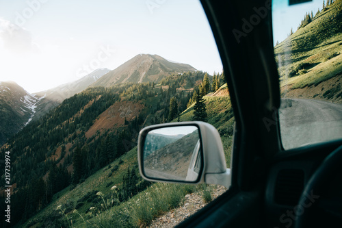 Rearview mirror on mountain road