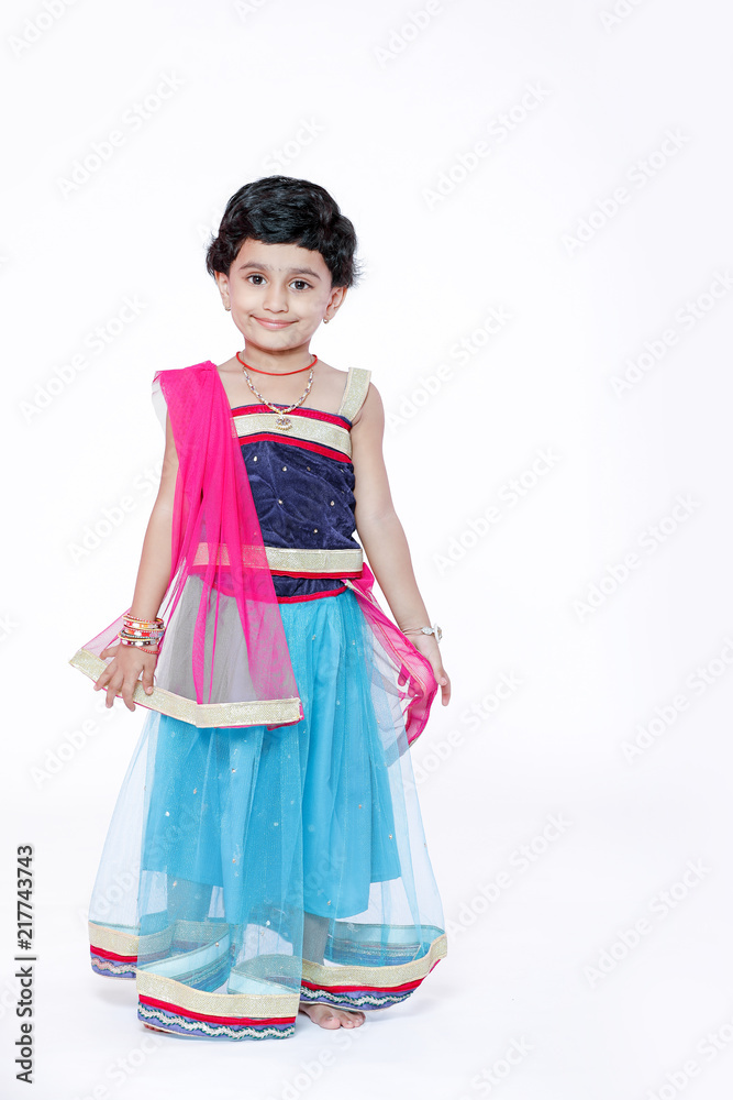 Little Indian girl child with lord ganesha and praying , Indian ganesh festival Little Indian girl child with lord ganesha and praying , Indian ganesh festival