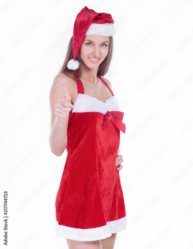 young woman model in a Christmas costume posing for the camera young woman model in a Christmas costume posing for the camera