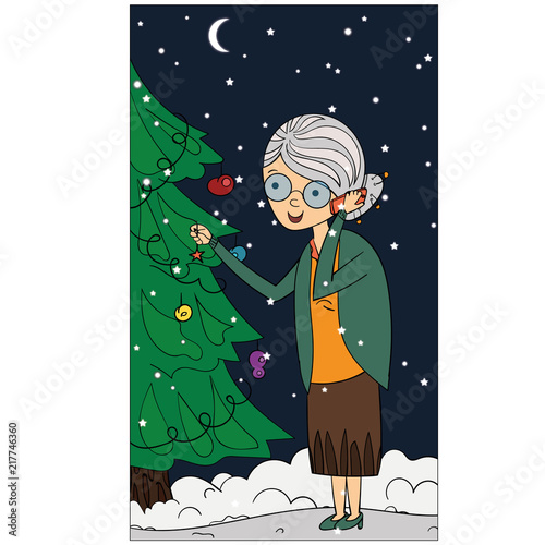 Grandmother decorate the Christmas tree