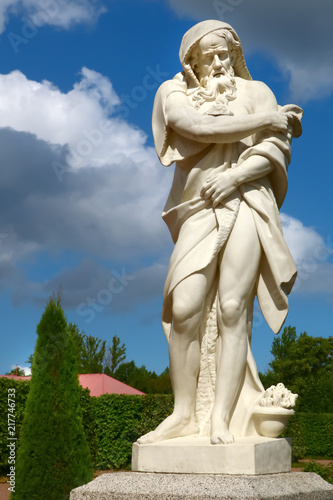 ancient sculptures in the summer park