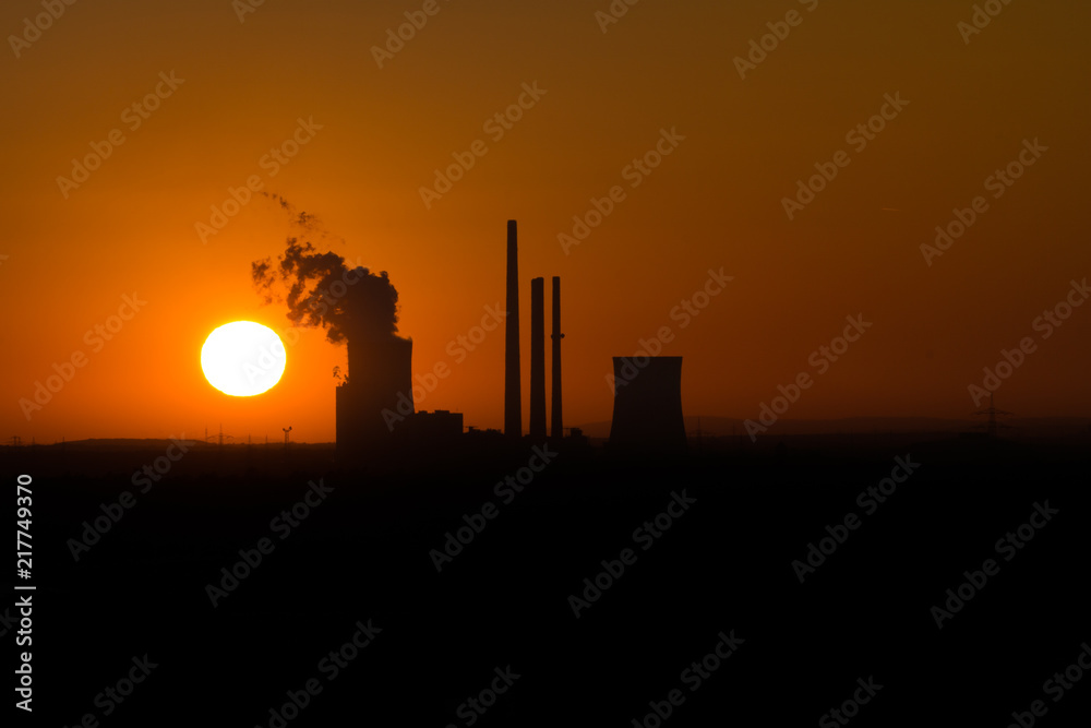 Power plant sunset silhouette