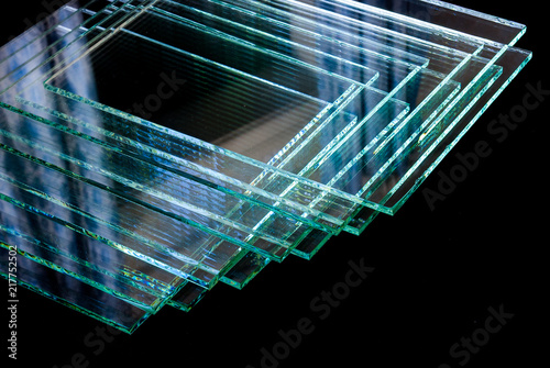 Sheets of Factory manufacturing tempered clear float glass panels cut to size photo