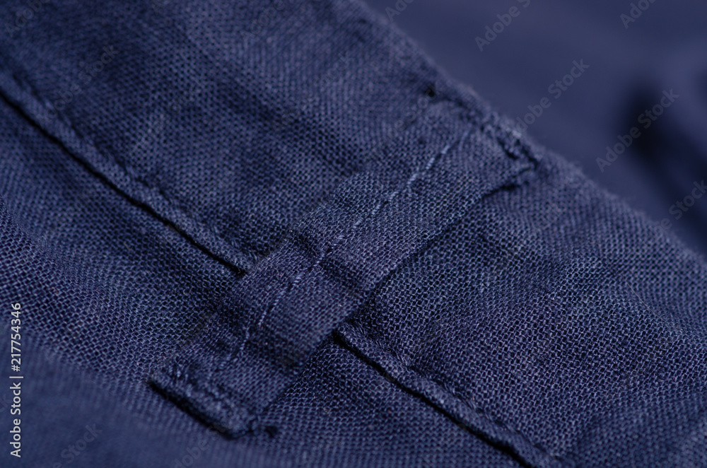 Naklejka premium Blue fabric material texture macro blur background