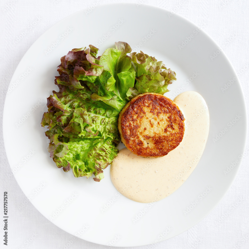 vegetable on lettuce leafs with hot pepper, mayo, and sour cream sauce