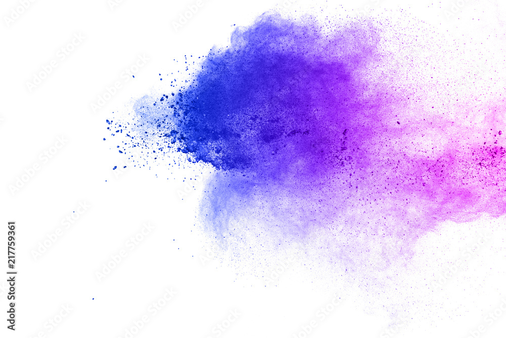 Abstract blue-purple dust explosion on  white background. Freeze motion of blue-pink powder splashing.