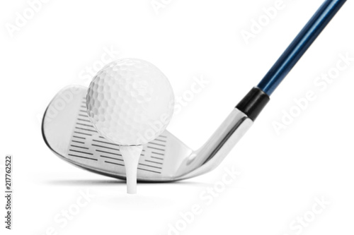 Golf ball on tee in front of golf stick on white background, included clipping path