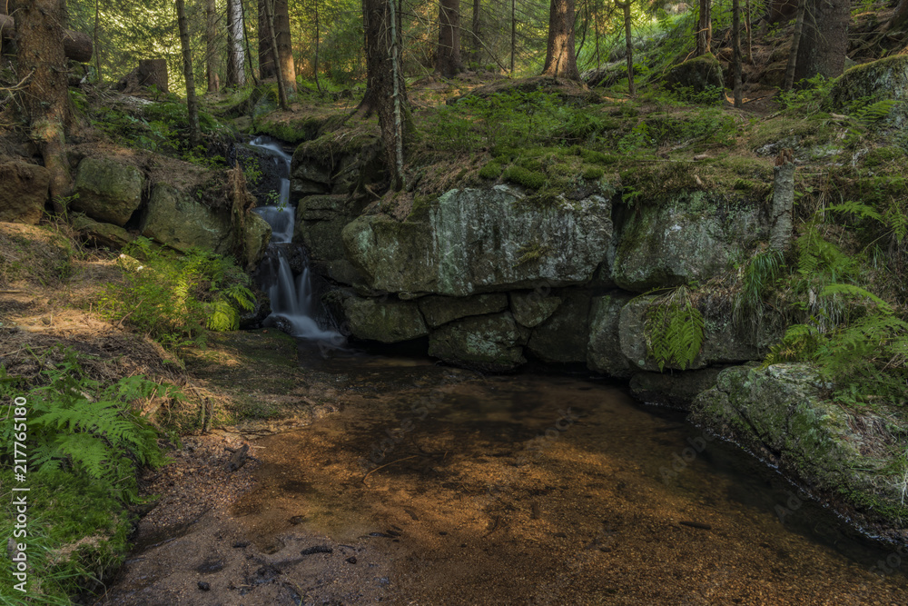 Miluscin waterfall on Bily creek in summer nice morning Miluscin waterfall on Bily creek in summer nice morning